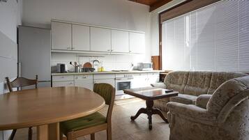 Comfort-Apartment | Wohnbereich | Fernseher