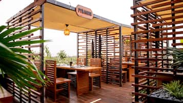 Breakfast, lunch, dinner served; local and international cuisine