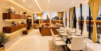 Presidential Suite | Living area | 50-inch Smart TV with satellite channels