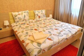 2 habitaciones, tabla de planchar con plancha, wifi y ropa de cama 