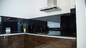 Villa | Private kitchen | Full-size fridge, oven, stovetop, dishwasher