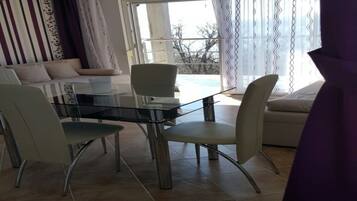 Apartment, 1 Bedroom (2) | Living area | Flat-screen TV