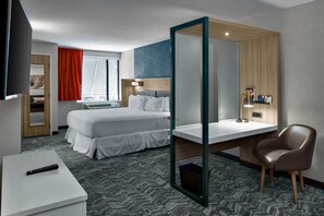 Desk, laptop workspace, blackout drapes, iron/ironing board