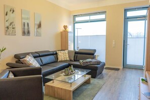 Apartment (Nr.49) | Living area | Flat-screen TV - Inselblume 20-21-48-49-50-55-56-62-71 (Fehmarn)