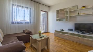 Apartment, 1 Schlafzimmer, Meerblick | Wohnbereich | Flachbildfernseher