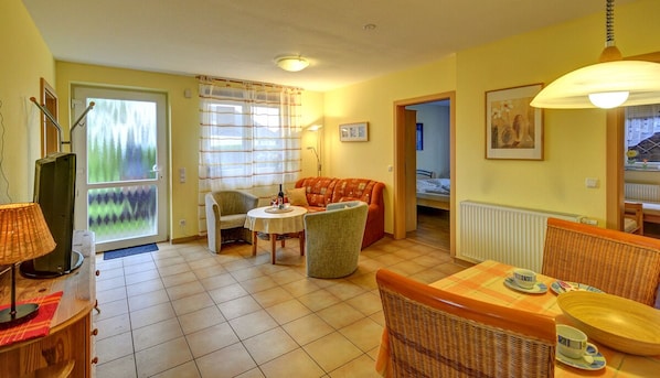 Apartment (Inselblume 41) | Living area | Flat-screen TV