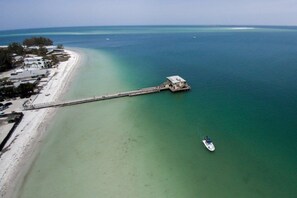 On the beach, sun-loungers, beach towels