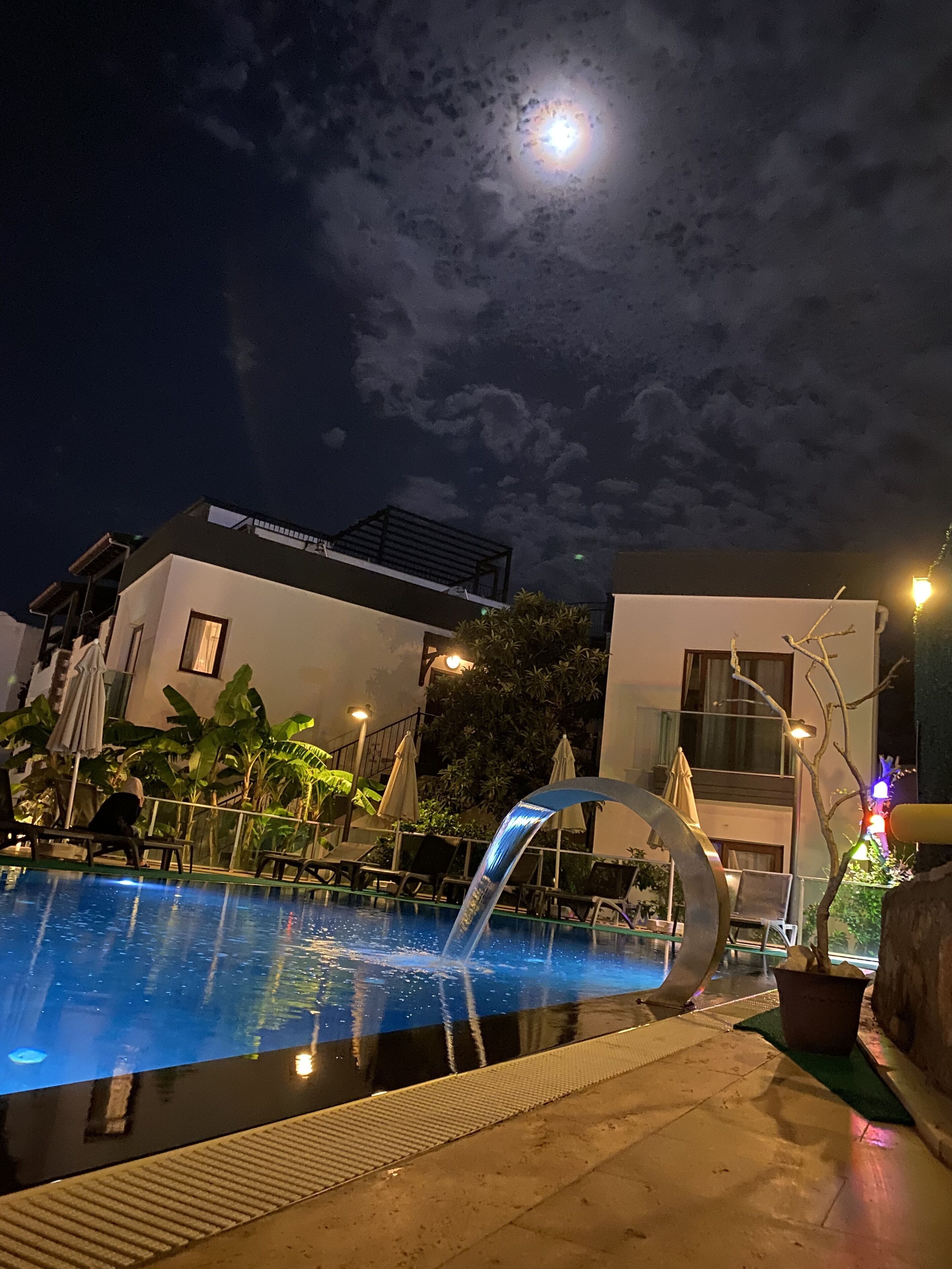 Seasonal outdoor pool, pool umbrellas