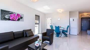 Apartment, 2 Bedrooms (2) | Living area | 50-inch flat-screen TV with satellite channels, TV