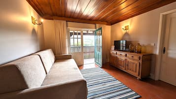 Apartment, 1 Bedroom | Living area | 30-cm LCD TV with cable channels, TV