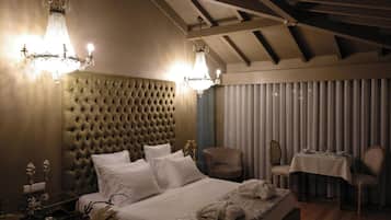 Minibar, blackout curtains, iron/ironing board, bed sheets