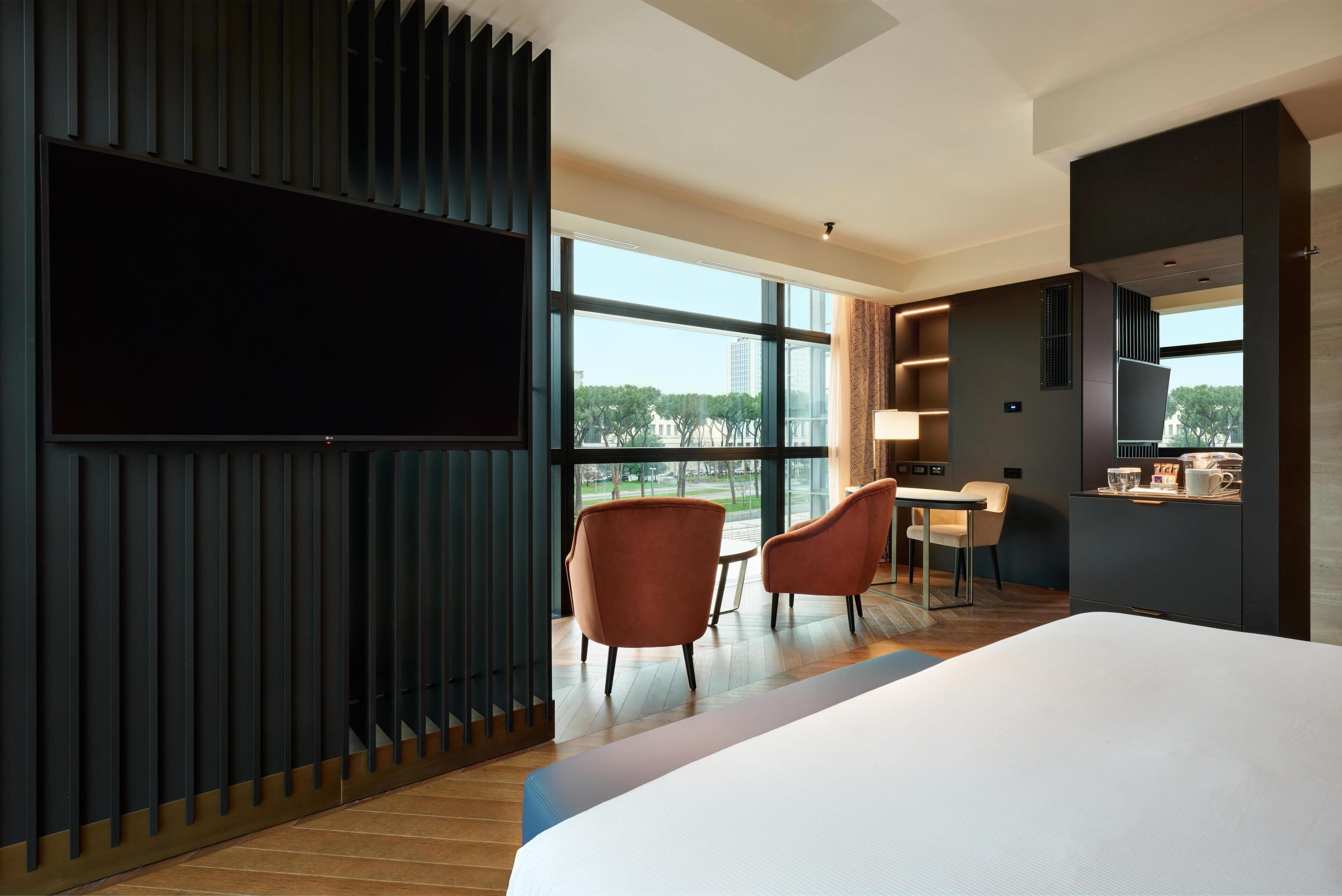 Rum - 1 kingsize-säng - hörn | Minibar, värdeförvaringsskåp på rummet och ljudisolering