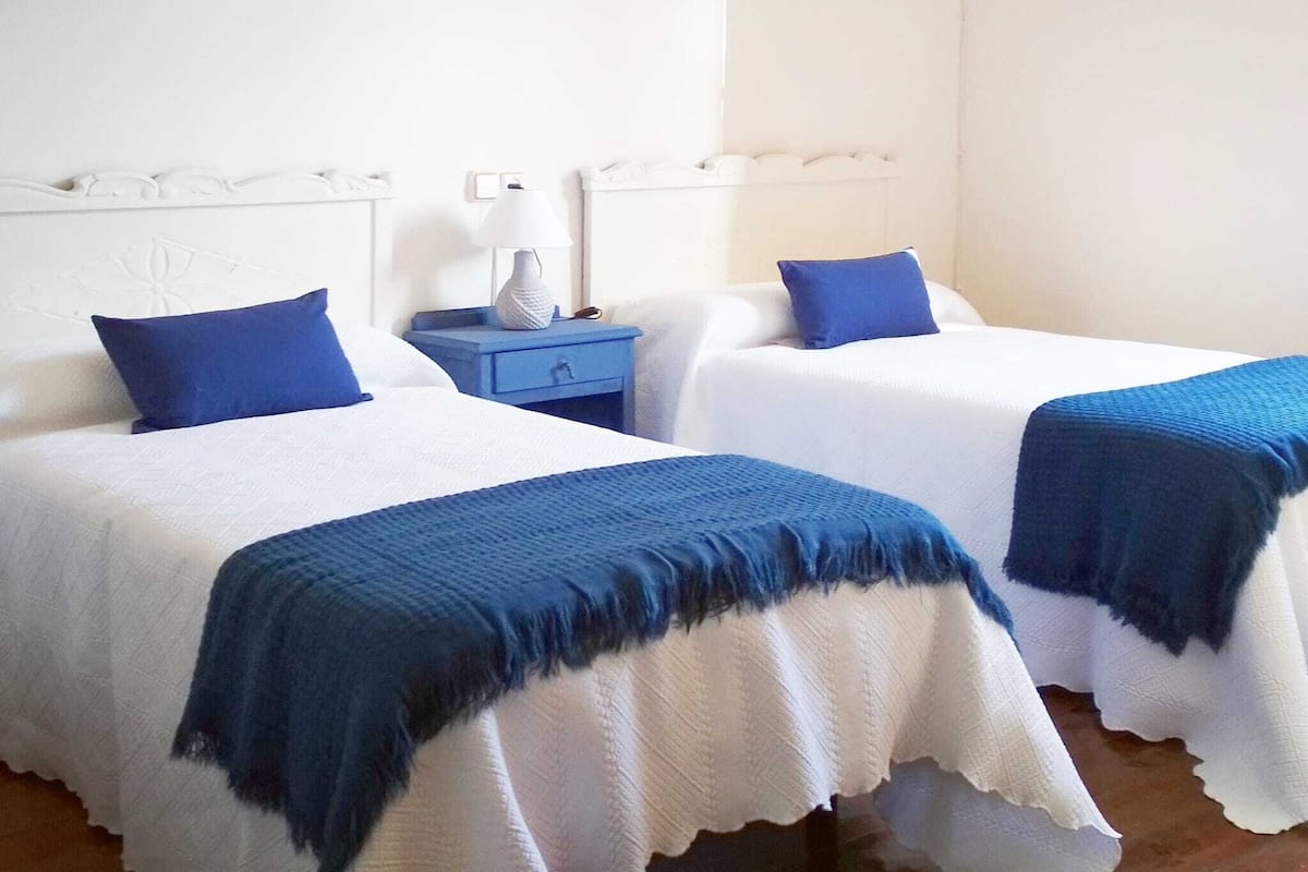 4 bedrooms, down duvets, iron/ironing board, free cots/infant beds