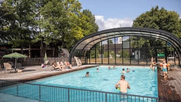 Indoor pool, seasonal outdoor pool, pool umbrellas, pool loungers