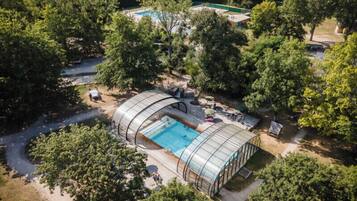 Indoor pool, seasonal outdoor pool, pool umbrellas, sun loungers