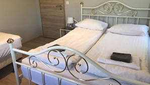 Camera tripla, bagno condiviso | Tende oscuranti, Wi-Fi gratuito, lenzuola