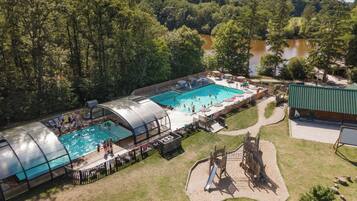 Indoor pool, seasonal outdoor pool, pool umbrellas, pool loungers