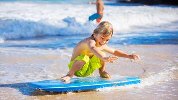 Guests can enjoy beach activities and scenic views.