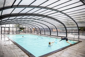 Indoor pool, open 9:00 AM to 6:00 PM, pool umbrellas, sun loungers