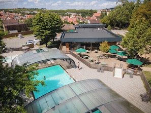 Indoor pool, open 9:00 AM to 6:00 PM, pool umbrellas, sun loungers