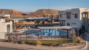A pool area with a fenced deck, a covered seating area, and a view of a mountainous landscape. - Oversized Private Hot Tub with XBOX (Washington)