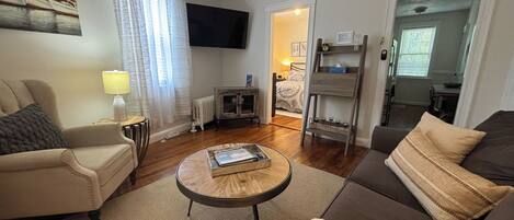 1 bedroom, desk, iron/ironing board, travel crib