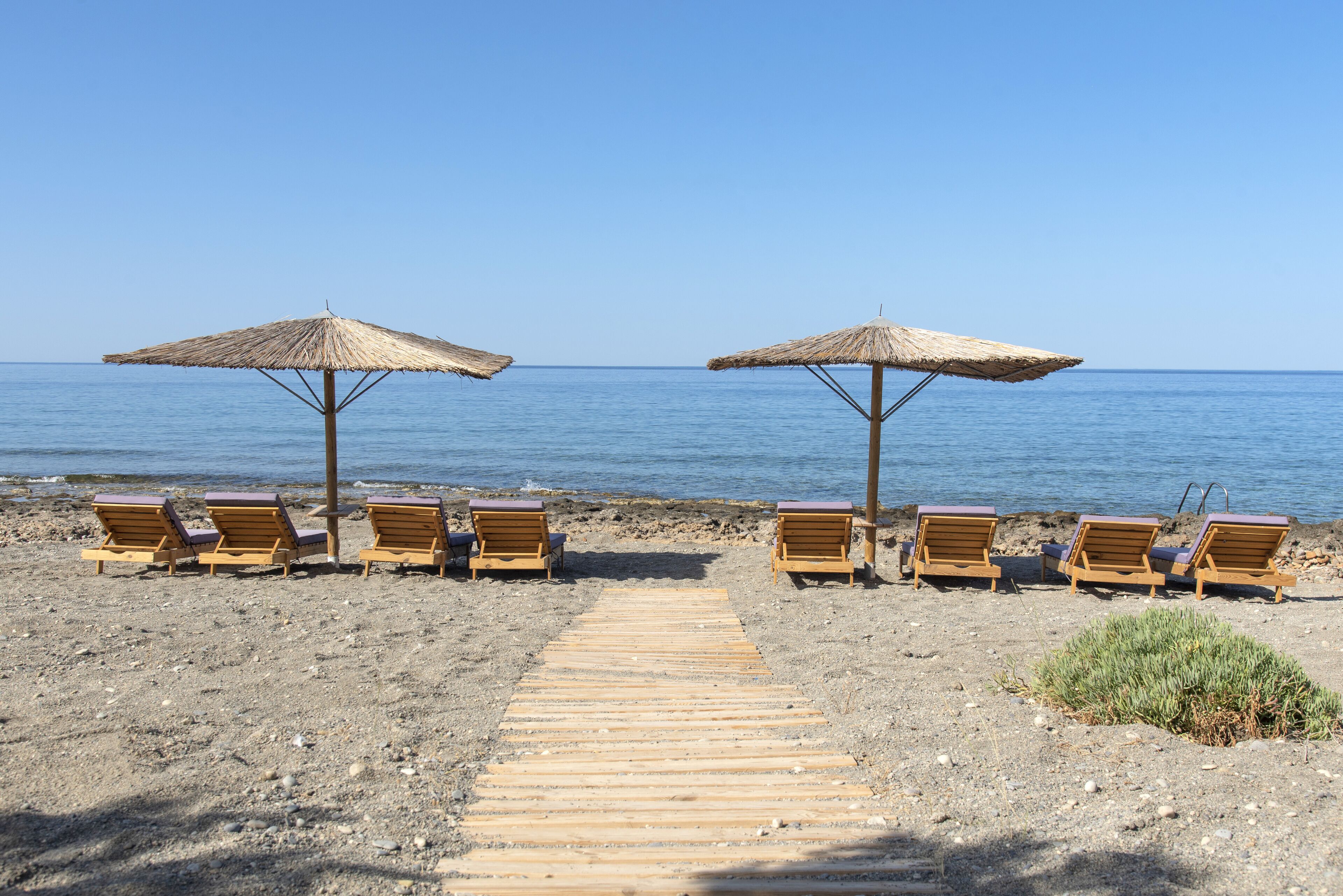 On the beach, sun loungers, beach towels