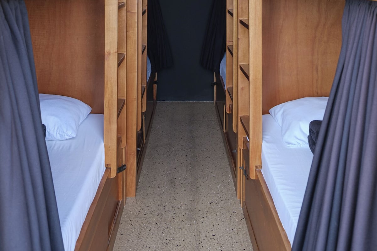 Shared Dormitory (8 pax) | Premium bedding, pillow-top beds, individually decorated