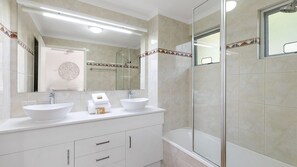 Combined shower/bathtub, hair dryer