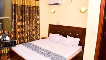 Chambre Double Deluxe | 1 chambre, rideaux occultants, fer et planche à repasser, Wi-Fi gratuit