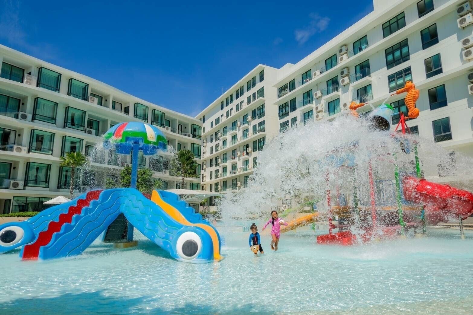 A water park with slides and a wave machine.