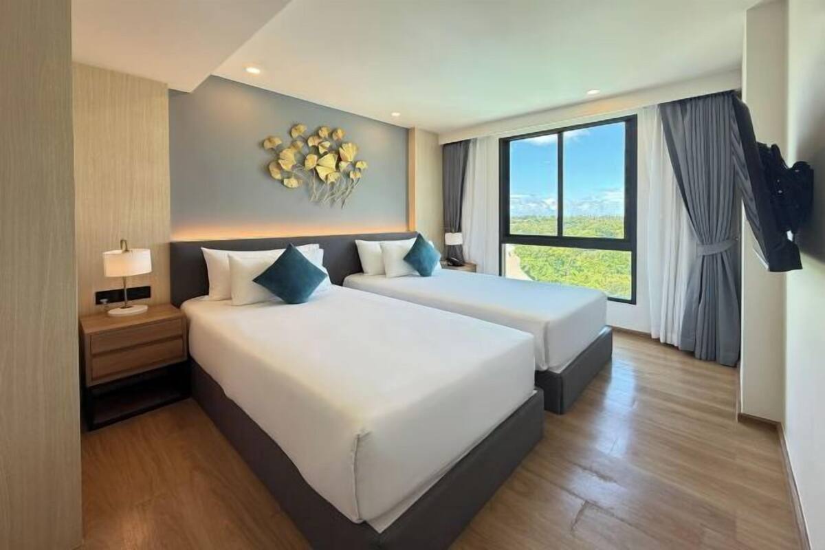 Premium bedding, pillow-top beds, free minibar items, in-room safe