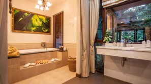 Separate tub and shower, deep soaking tub, free toiletries, hair dryer