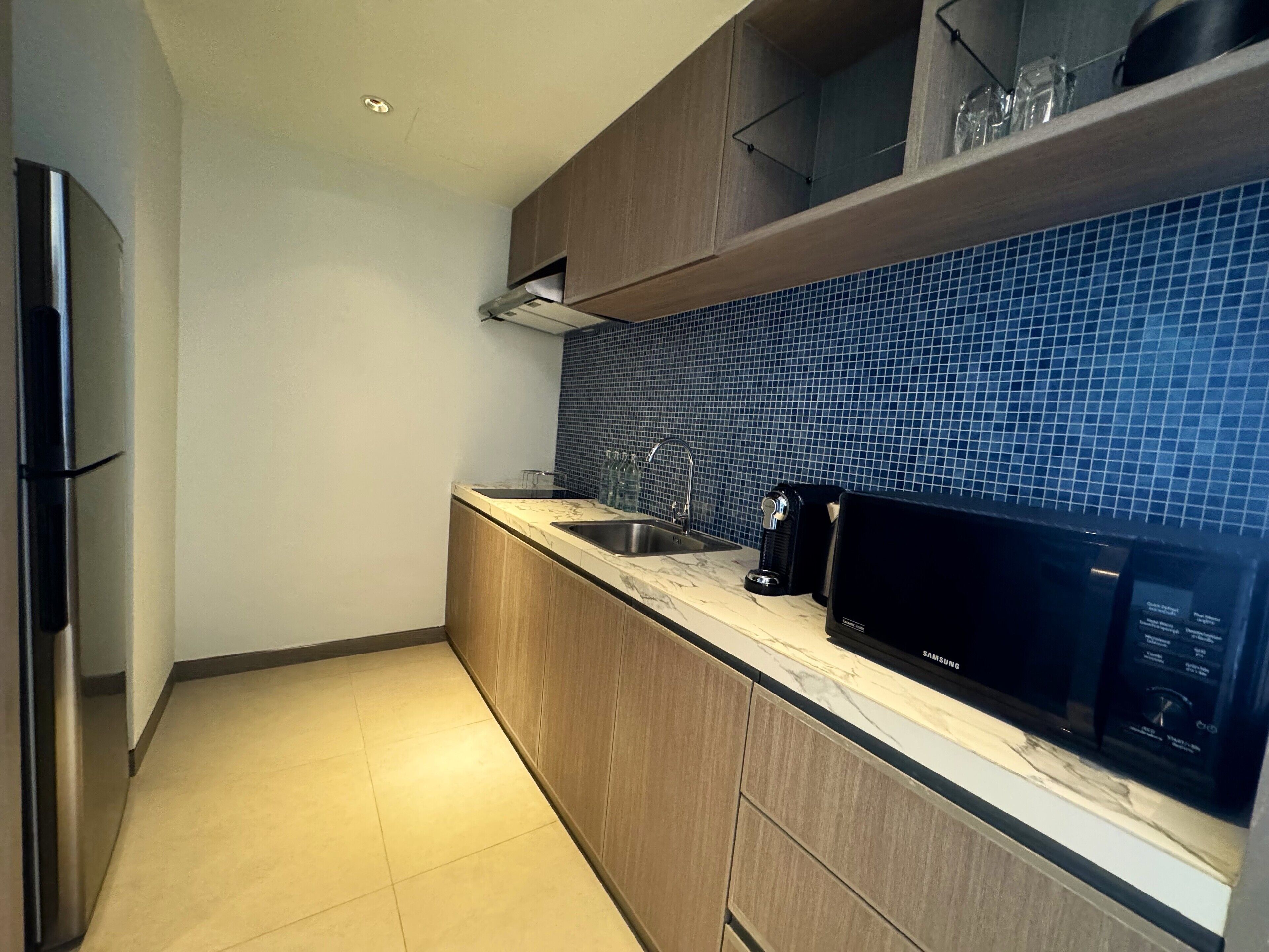 family room | 1 bedroom, free minibar items, in-room safe, desk