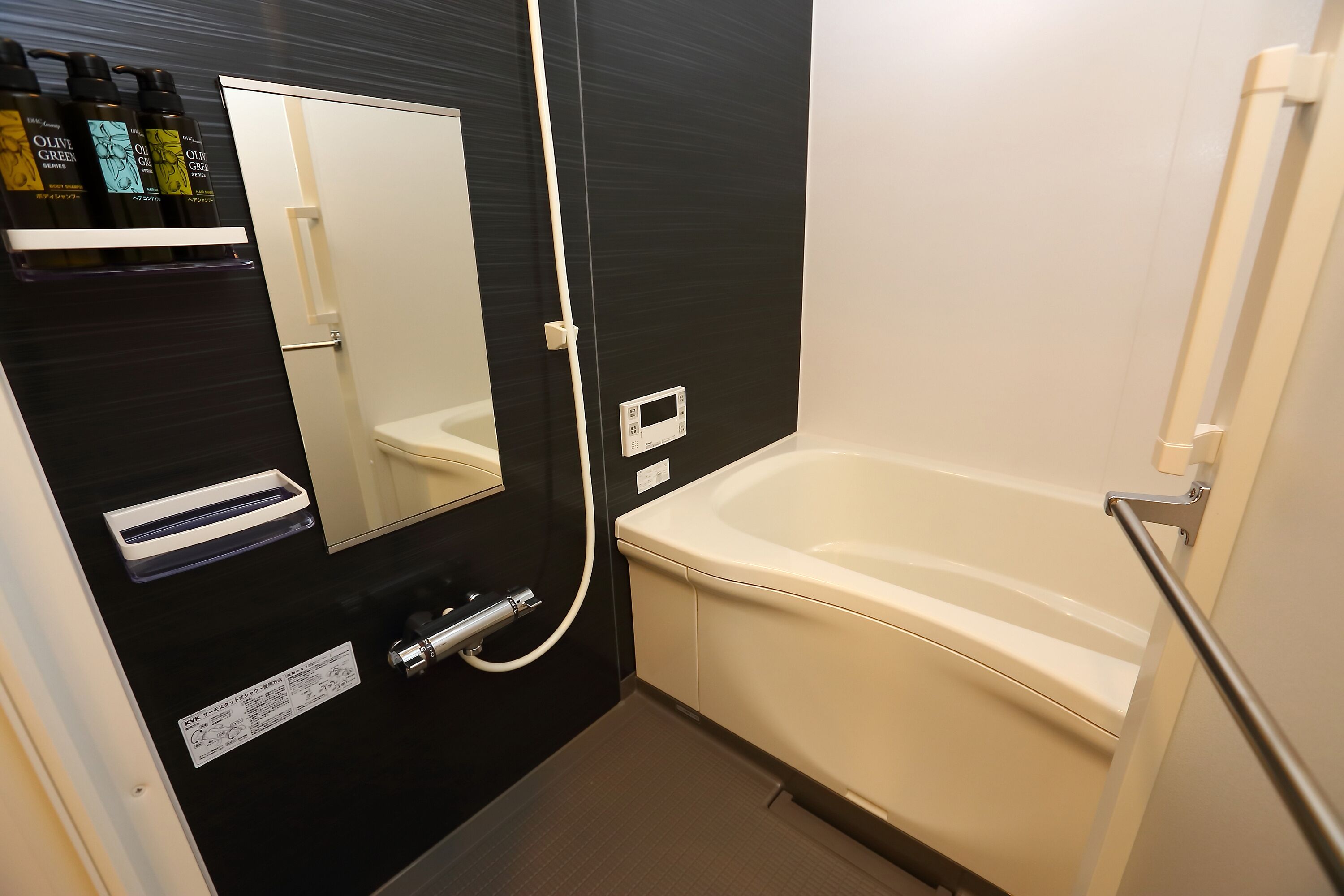 combined shower/bathtub, hair dryer, slippers, electronic bidet