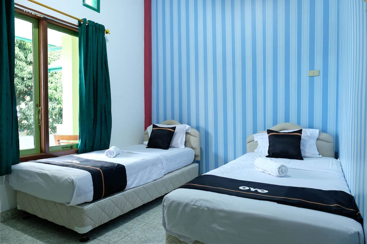 Deluxe Twin kamer | Een bureau, gratis wifi, beddengoed