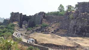 A historical site with ancient ruins and a paved pathway. - Hotel Shripad Continental (Amravati)