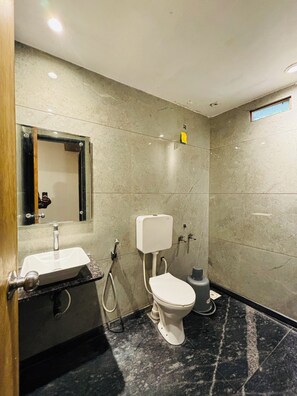 Family Quadruple Room | Bathroom | Shower, free toiletries, bidet, towels - Hotel Regency (Amravati)