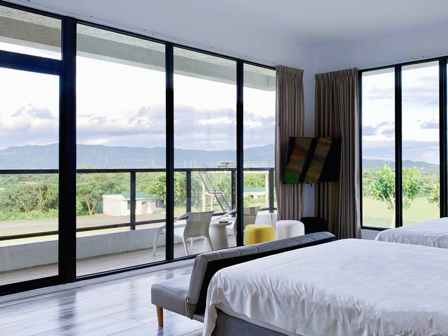 Panoramic Quadruple Room, Multiple Beds, Balcony, Mountain View | Premium bedding, down duvets, free minibar, individually decorated