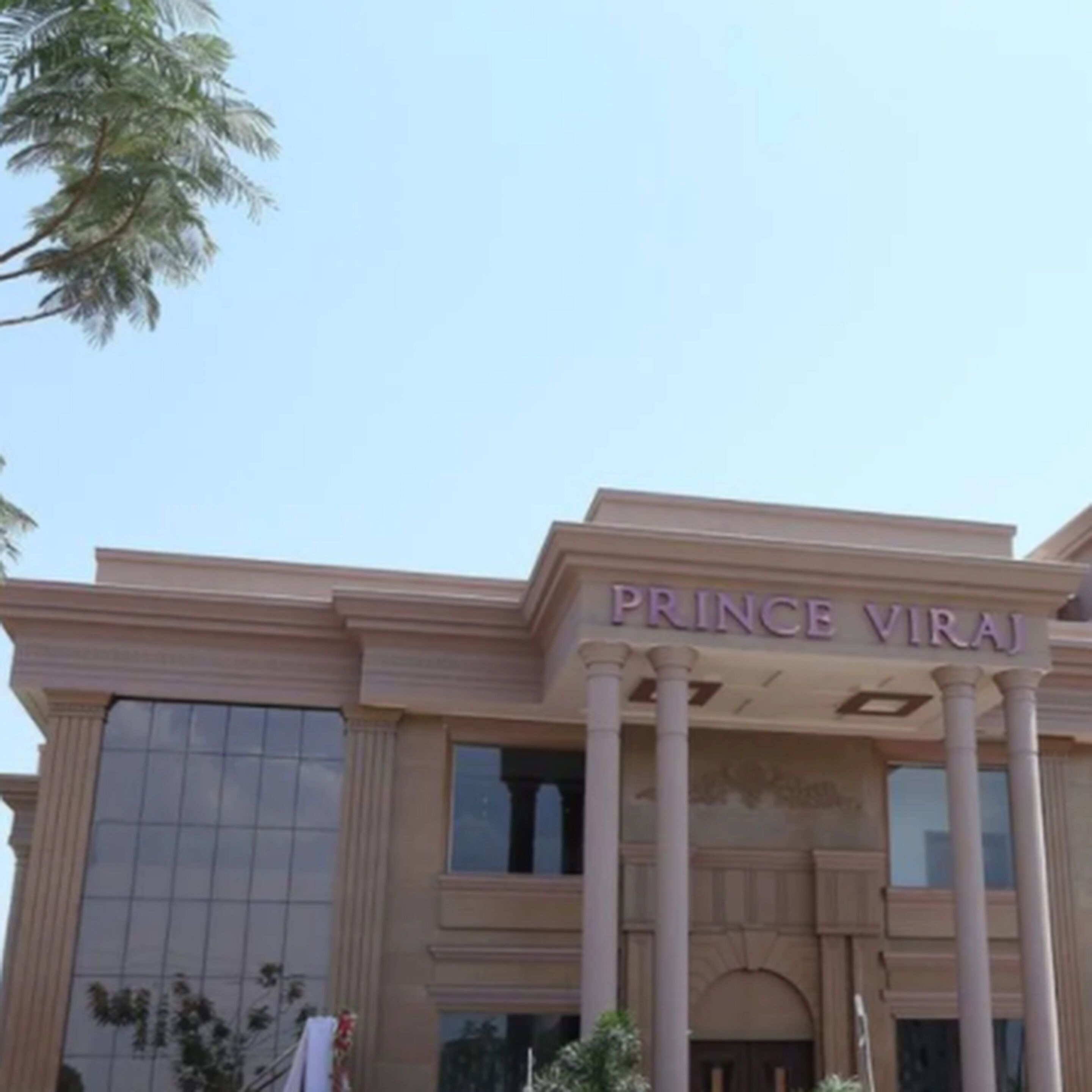 A building with the sign "PRINCE VIRAJ" indicating a hotel or establishment.