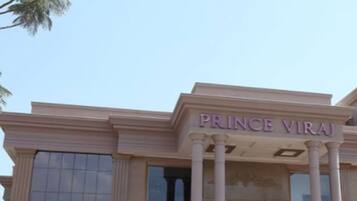 A building with the sign "PRINCE VIRAJ" indicating a hotel or establishment.