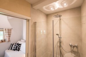 Shower, rainfall showerhead, eco-friendly toiletries, hair dryer