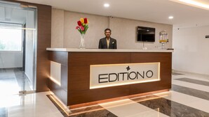 A reception desk with a sign reading "EDITIONO" in a modern hotel lobby. - Collection O 30002 Bhel Hyderabad (Sangareddi)