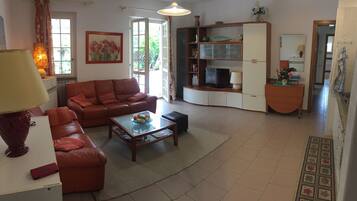 Apartment, 2 Bedrooms | Living area | Flat-screen TV