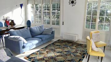 Apartment, 2 Bedrooms | Living area | Flat-screen TV