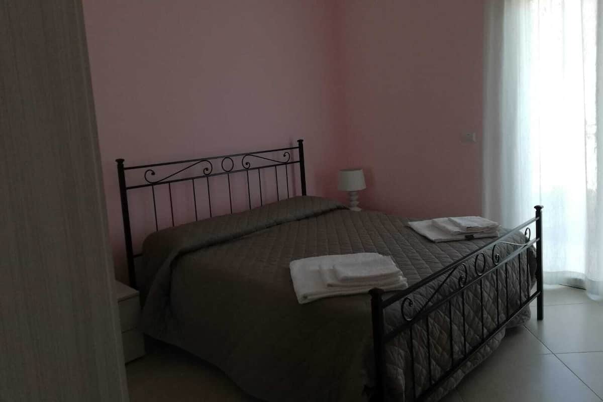Desk, laptop workspace, free WiFi, bed sheets