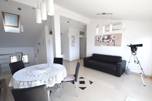 Huoneisto, 2 makuuhuonetta | Oleskelualue | Taulutelevisio