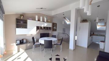 Apartment, 2 Bedrooms | Living area | Flat-screen TV