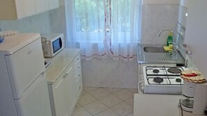 Apartment, 2 Bedrooms | Private kitchen | Fridge, microwave, oven, stovetop - Apartment Ivana (Omisalj)