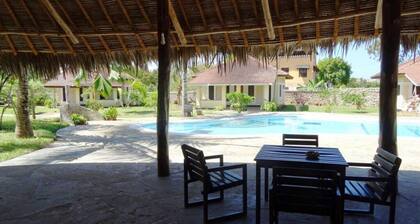 Perfect pool view and beach relaxation at Diani.
